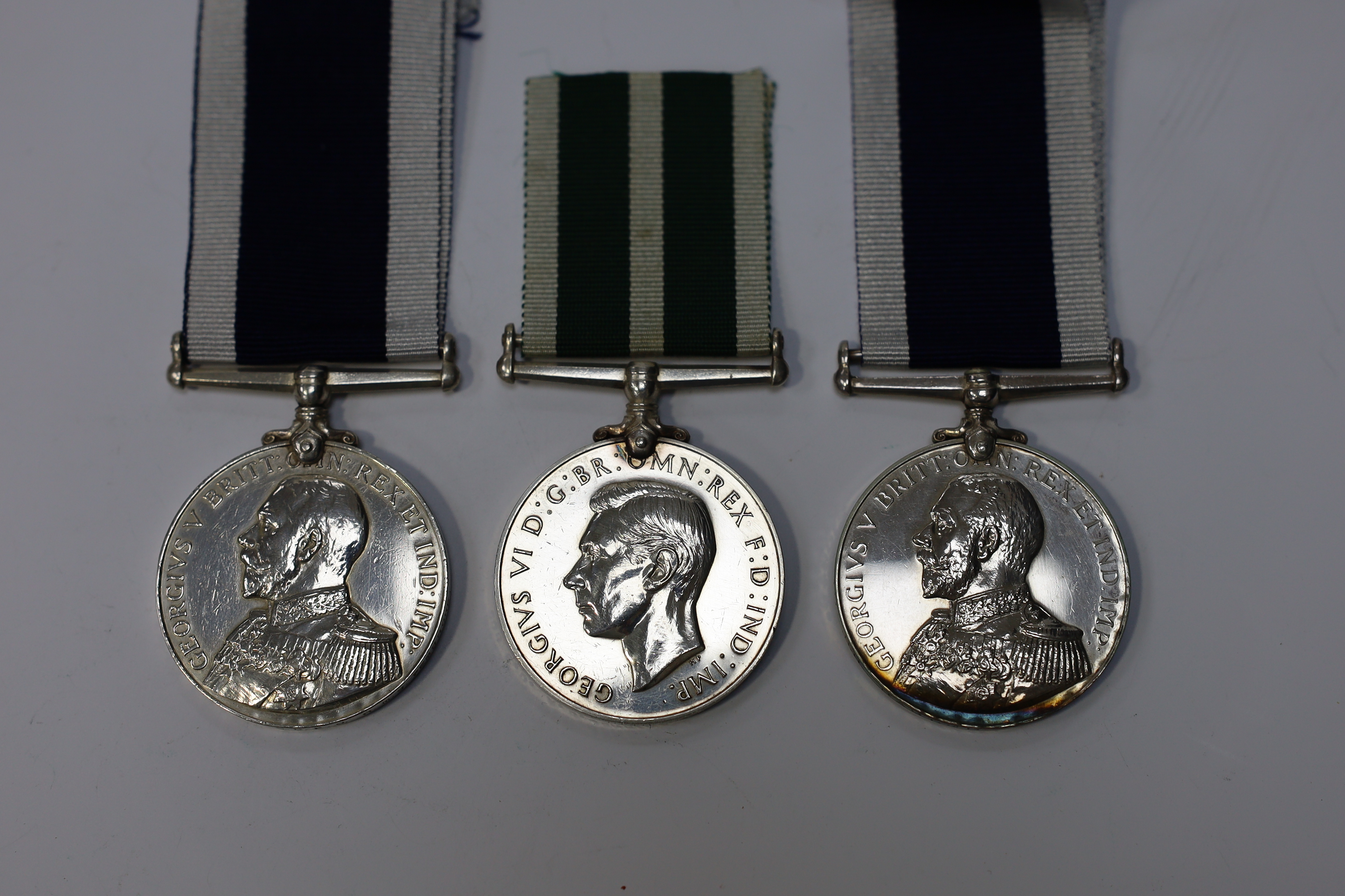 Three Naval LSGC medals; GV RNLSGC to 218949. S.H.Hasler.A.B. H.M.S.Pembroke.I.; GV RNLSGC to 351697 A.E.Day. S.B.P.O. H.M.S.Pembroke.; GVI RNRLSGC to 208. E.D. A.B.Jenkins.E.R.A. R.N.R. Condition - fair to good